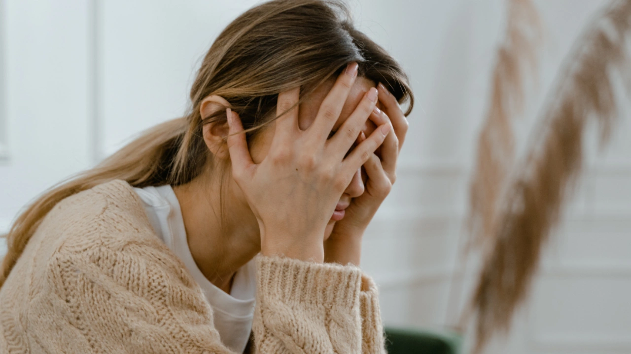 A person experiencing guilt and grief after a difficult event